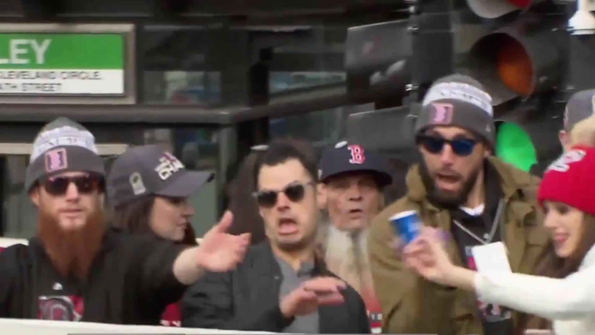 Beer can breaks trophy during Red Sox World Series parade 