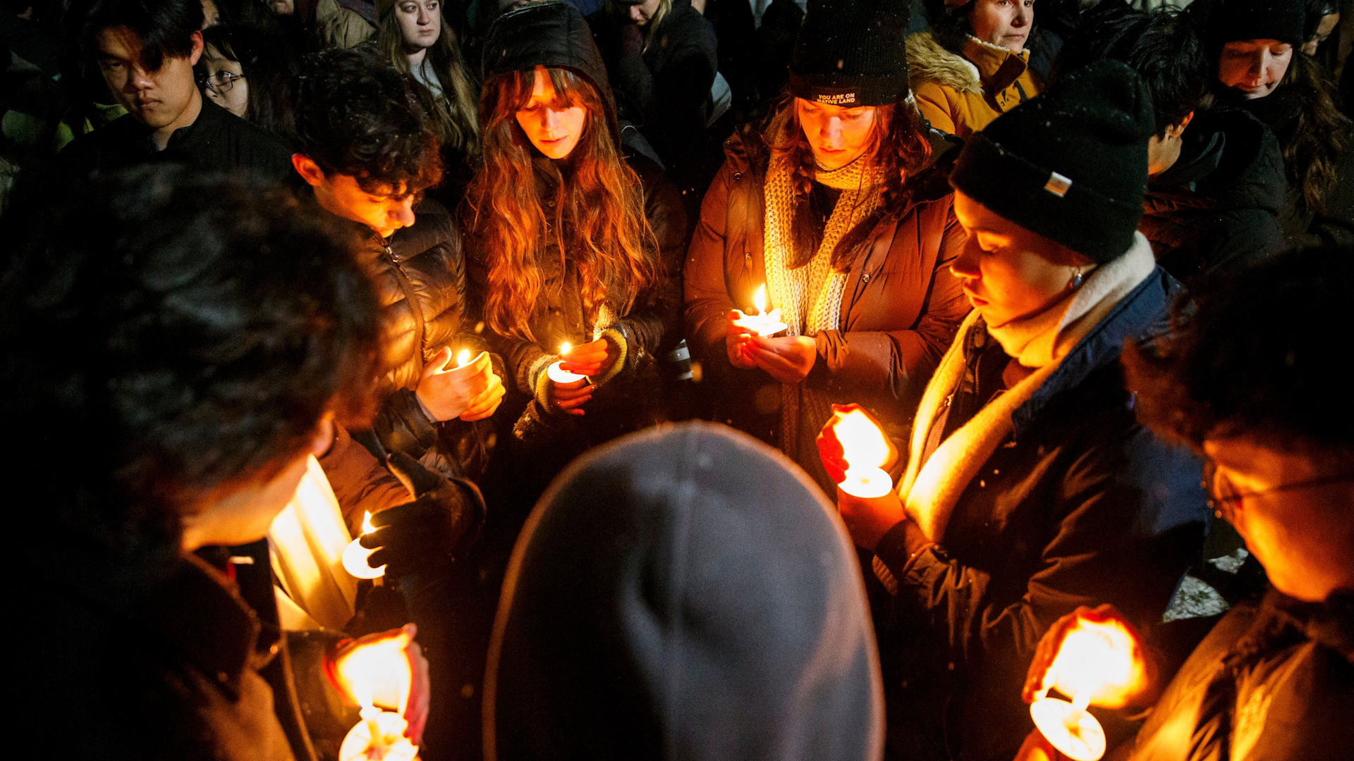 Candlelight vigil held for the victims of the shooting at Brown University that left two people dead and nine more injured.